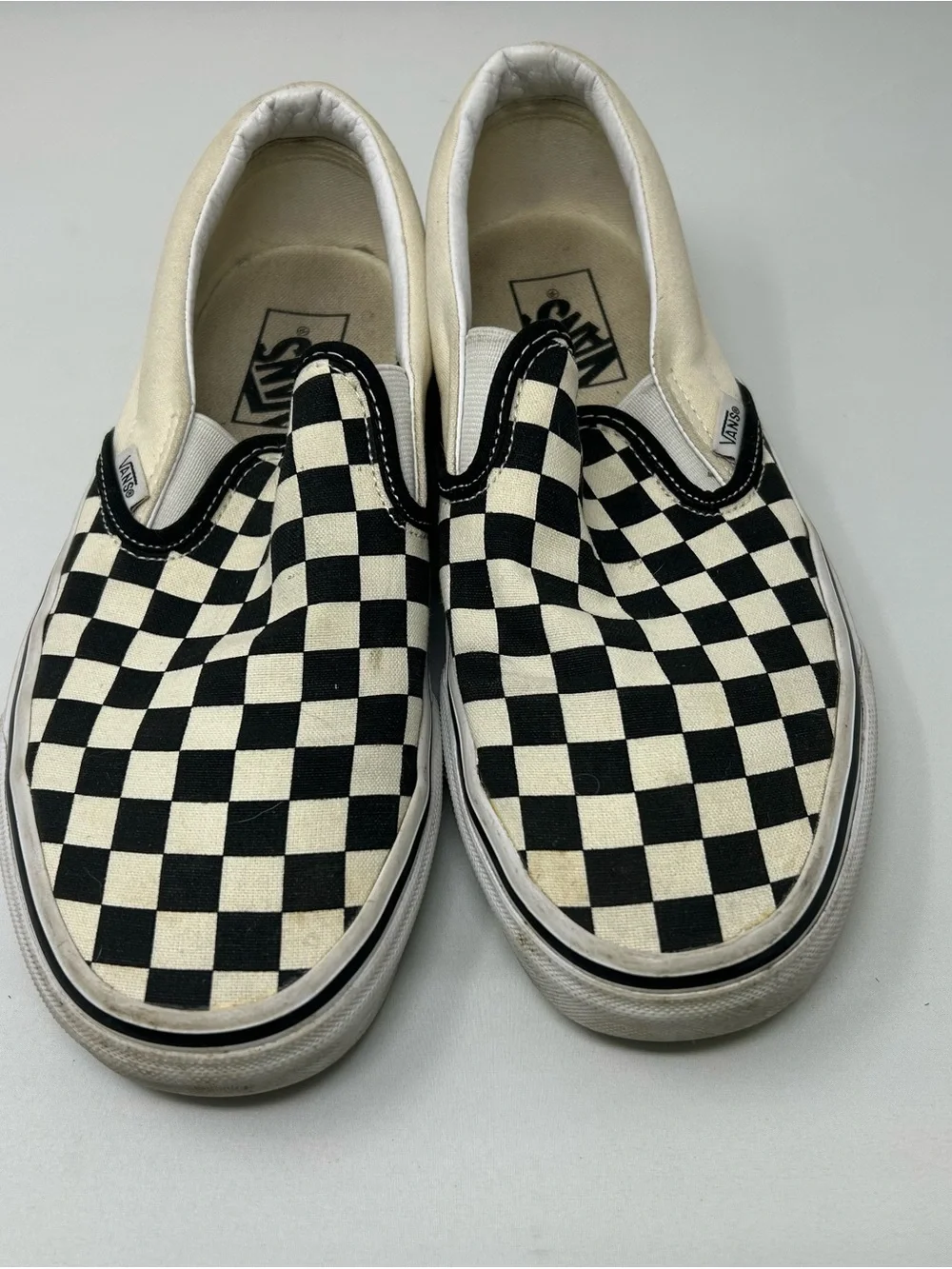 Vans Slip-On Checkerboard Canvas Sneakers in Black and White